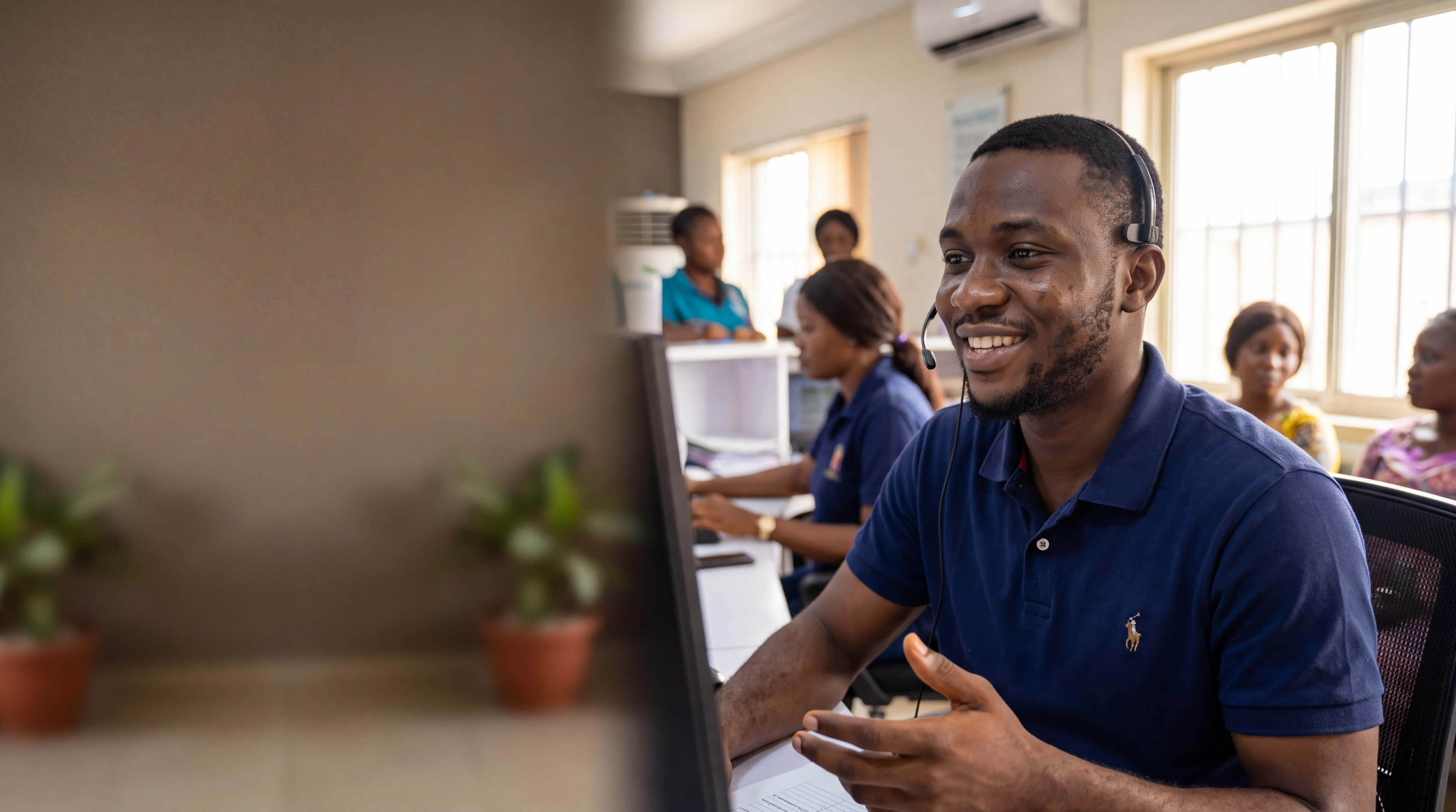Patient support coordinator helping a caller